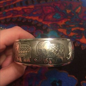 Marching elephant bangle